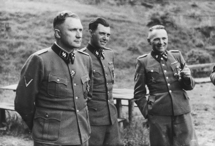 Three SS officers, including the notorious Dr Josef Mengele.