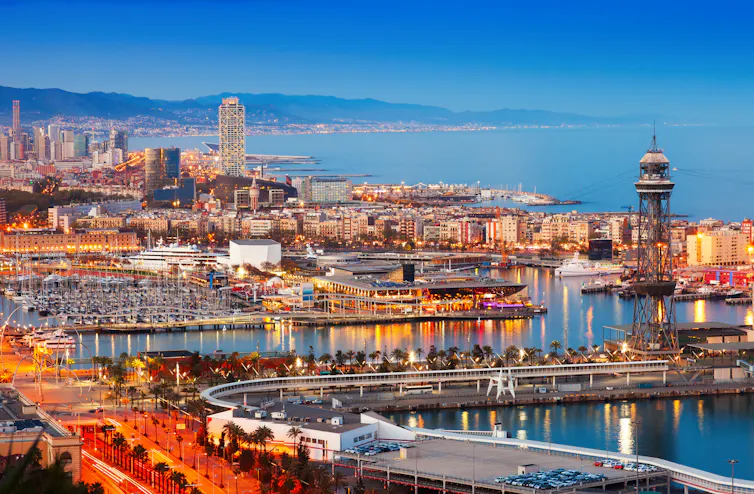 A waterfront city at dusk