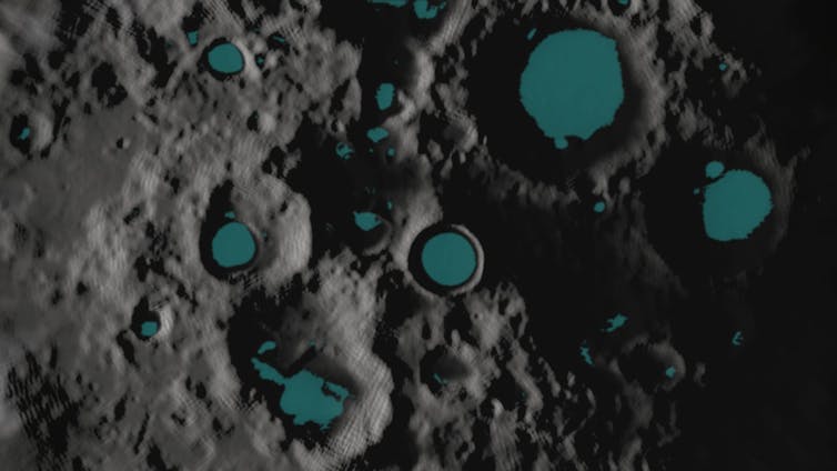 Map of the lunar south pole showing the terrain in grey and green circles representing the crater ice deposits.