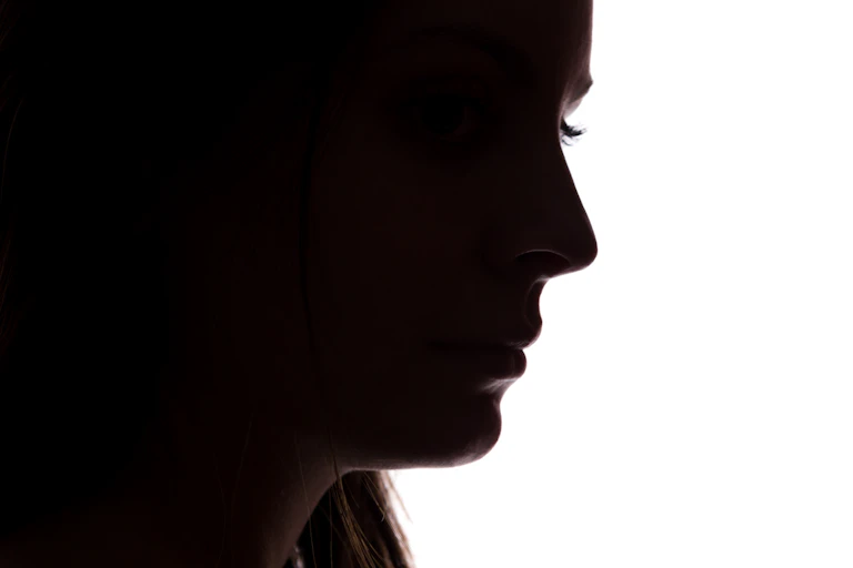 Silhouette of young woman