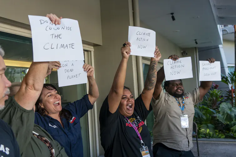Members of the First Nations Clean Energy Network in Cairns demanding a voice in the net zero transition.