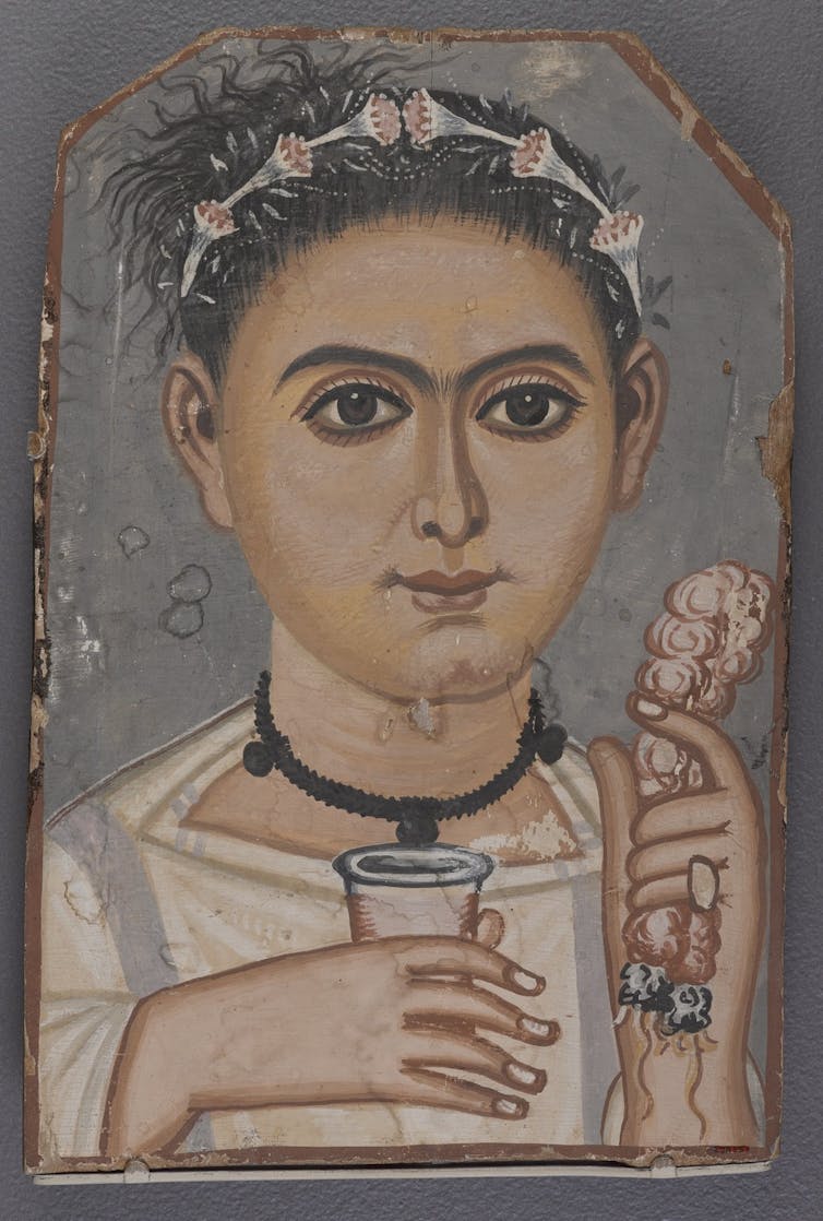 Boy with a Floral Garland in His Hair