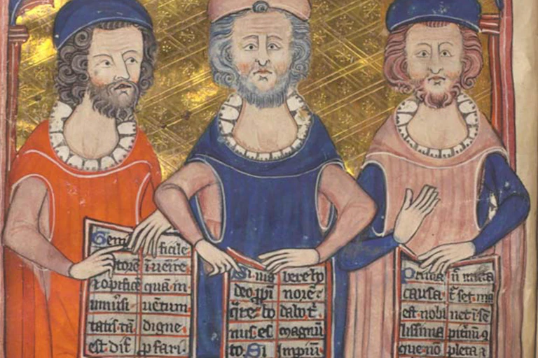 three men holding scripts.