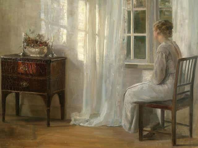 Painting of a woman sat alone by a window