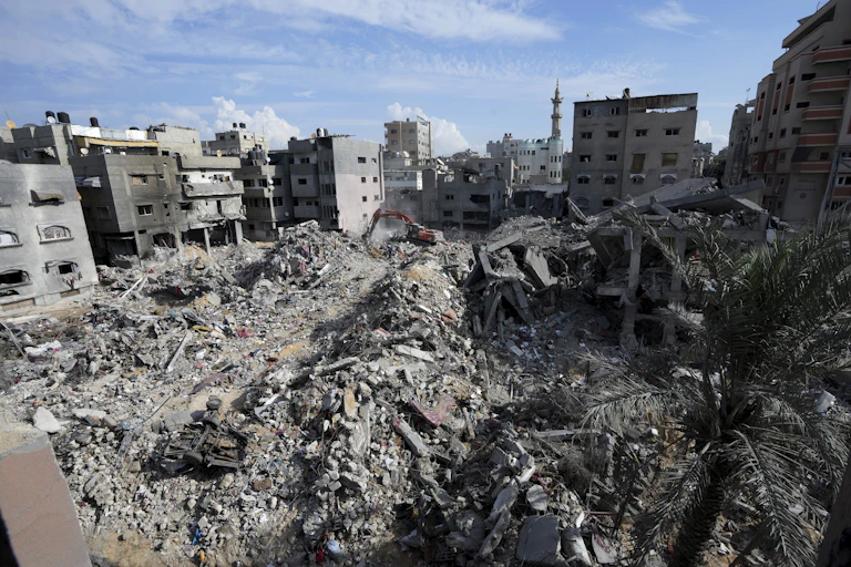 A city scene full of rubble of destroyed buildings.