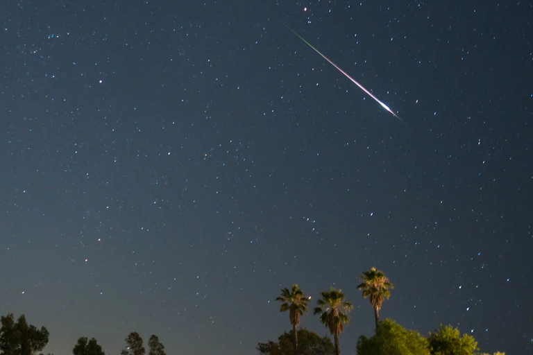 A meteor in the night sky.
