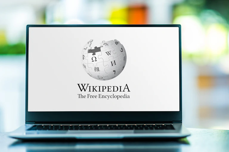 The Wikipedia logo on a laptop