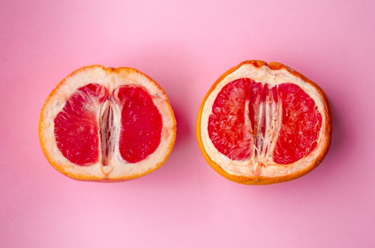 Two cut grapefruit, one drier than the other