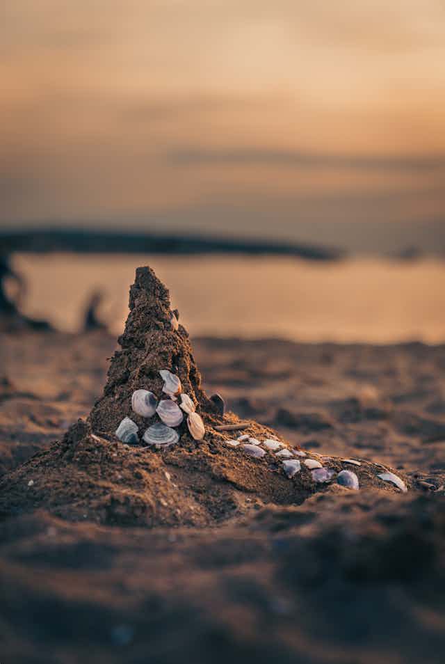 A small sandcastle at sutset