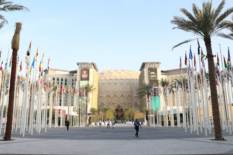 Conference centre with lots of flags outside