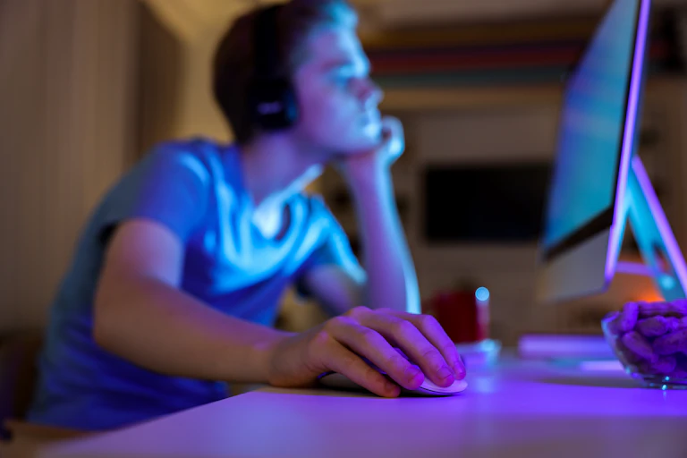 Boy looks at computer