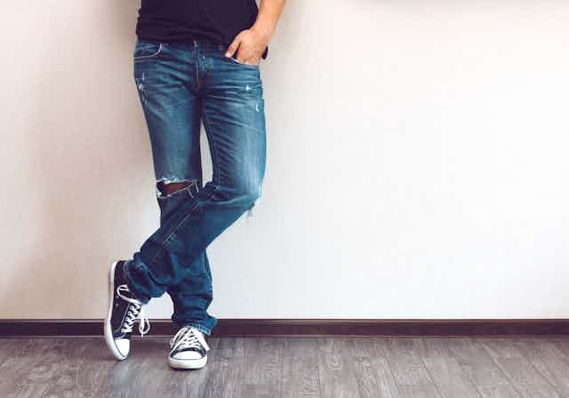 Man's legs wearing jeans