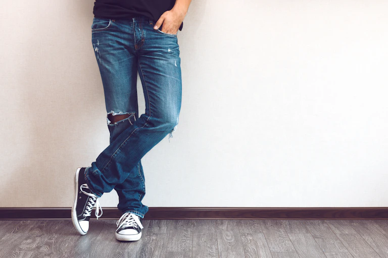 Man's legs wearing jeans