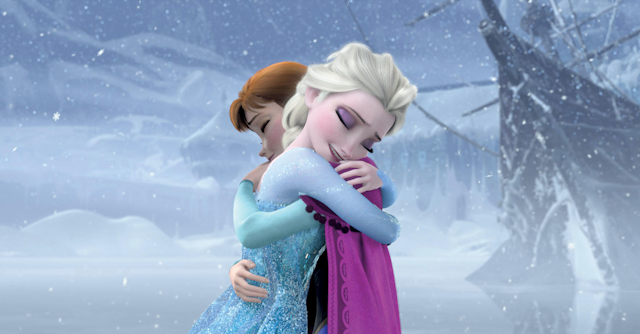 Two cartoon sisters one blonde, one red head, embracing against a snowy background.