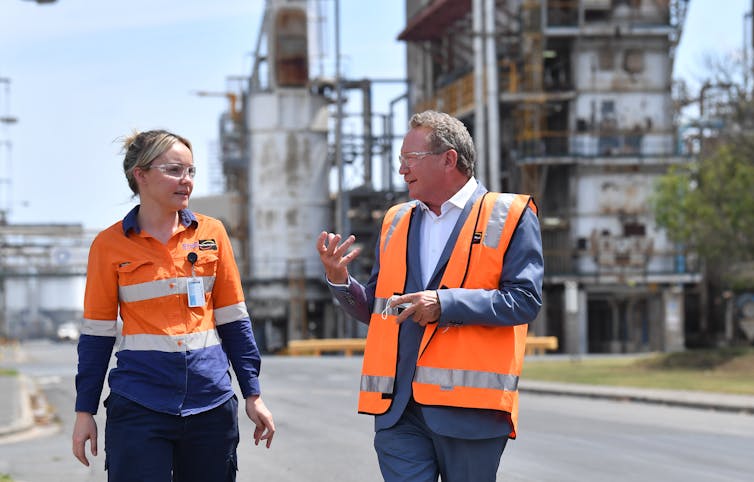 Worker Christie Rossi with Andrew 'Twiggy' Forrest after his company Fortescue Future Industries announced a partnership with Incitec Pivot to study the feasibility of green ammonia production at Incitec Pivot's Gibson Island plant in Brisbane in 2021.