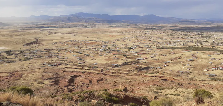 Landscape with distant mountains.