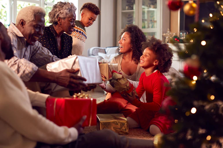 A family exchanges gifts.