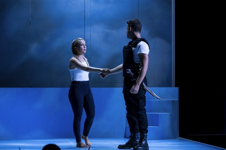 A man and woman on stage.