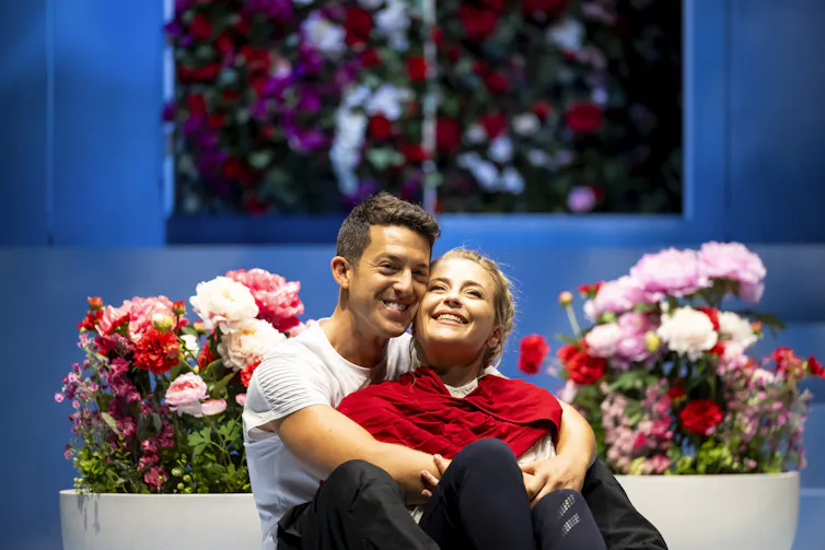 A couple embrace.