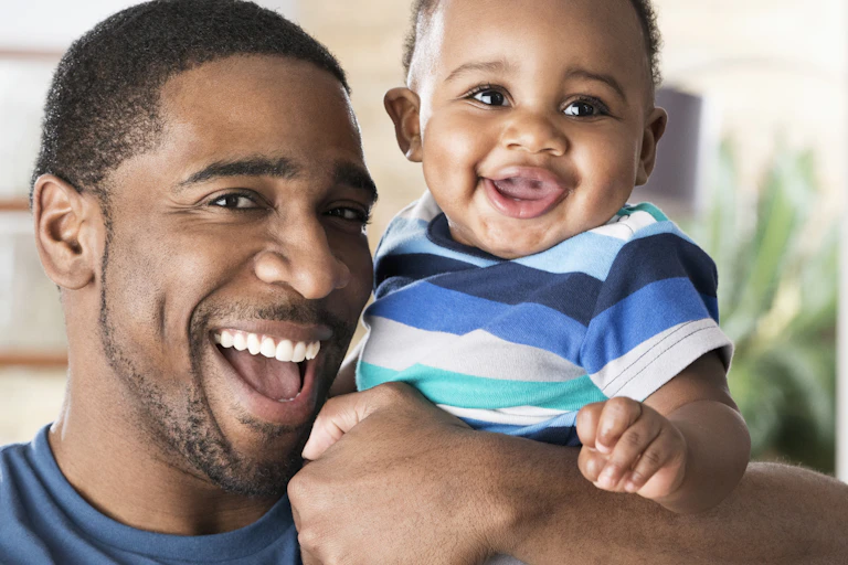 Man holding baby