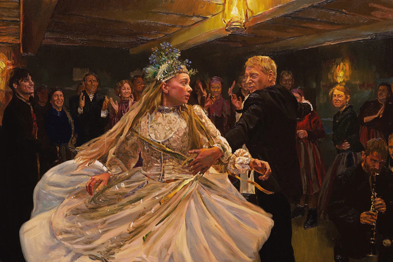 Two people dancing at a wedding.