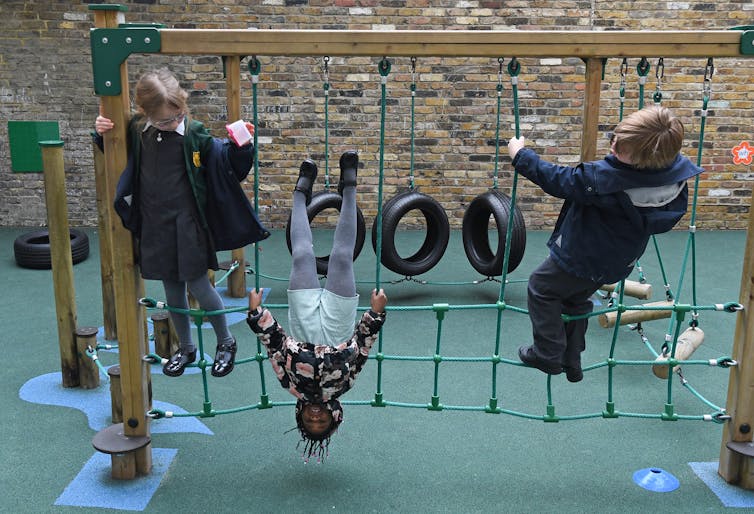 Year 2 pupils play during break time at Halley House School in east London, 8 March 2021