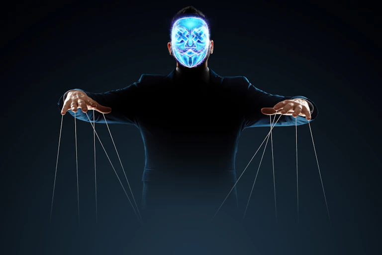 Man with blue holographic face with puppet strings hanging from hands