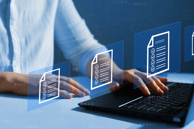 someone sitting at a laptop with icons of checklists