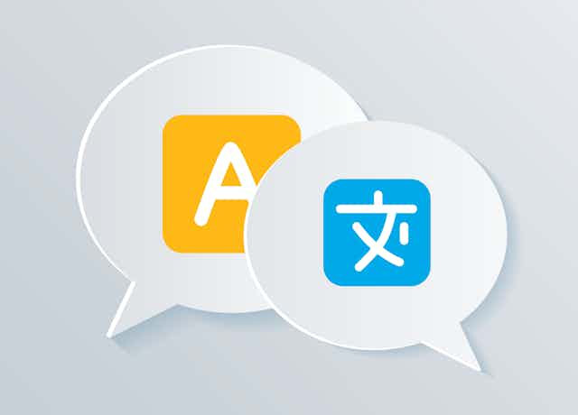 Illustration of overlapping speech bubbles, one with a yellow square with an "A" in the center and one with a blue square with the Chinese character "文" in the center.