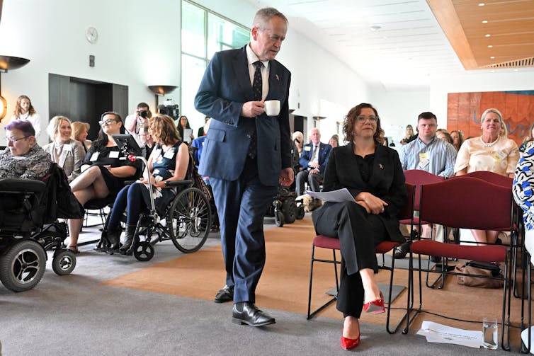 gathering of people, some with disability, at an official function