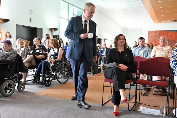 gathering of people, some with disability, at an official function