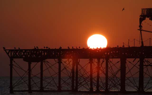 Sunset over a pier.