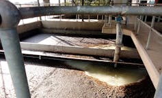 A water treatment plant with muddy and sludgy brown water