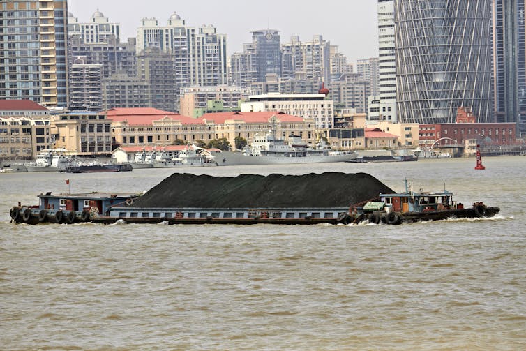 coal barge in middle of shanghai