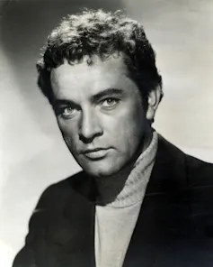 A young man in the 1950s with a very direct engaging expression.