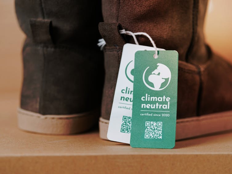 Pair of boots with a Carbon Neutral label