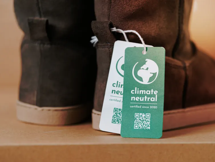 Pair of boots with a Carbon Neutral label