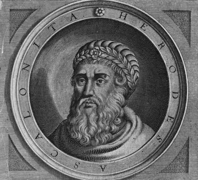 A black, gray and white illustration of a serious-looking man with a curly beard.