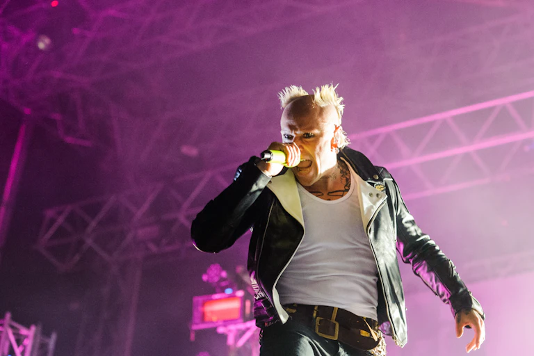 The lead singer of The Prodigy singing.
