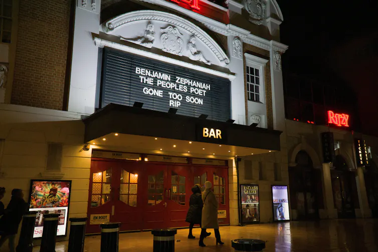 A tribute on the facade of a cinema.