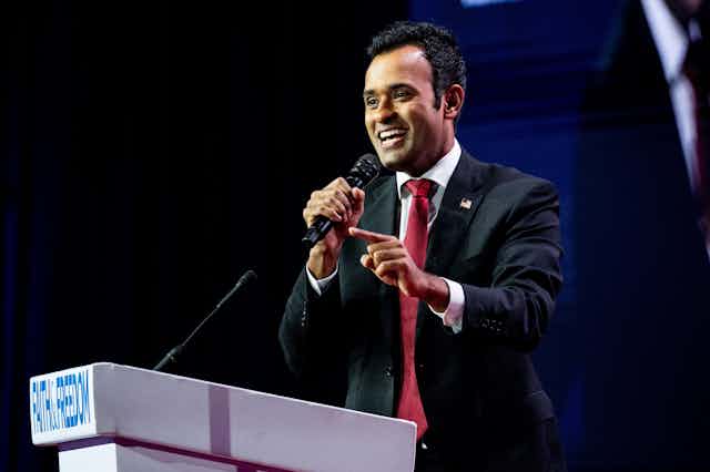 Vivek Ramaswamy, candidate to be the Republican nominee for US president, at a podium speaking.