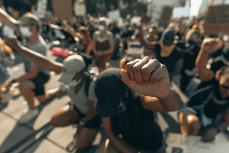 Protestors take the knee in a Black Lives Matter rally.