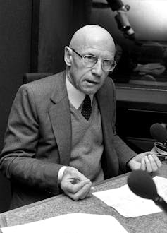 A man in a suit - Foucault.
