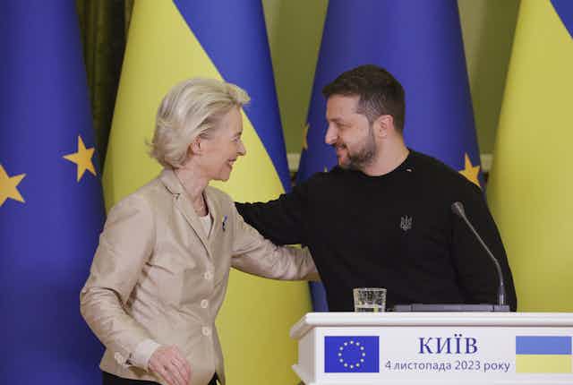 President of the European Commission Ursula von der Leyen smiles as she hugs Ukraine's President Volodymyr Zelensky.