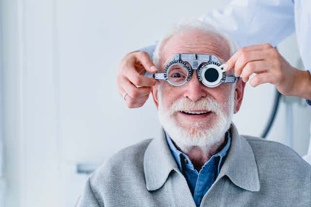 Older man having his eyes tested