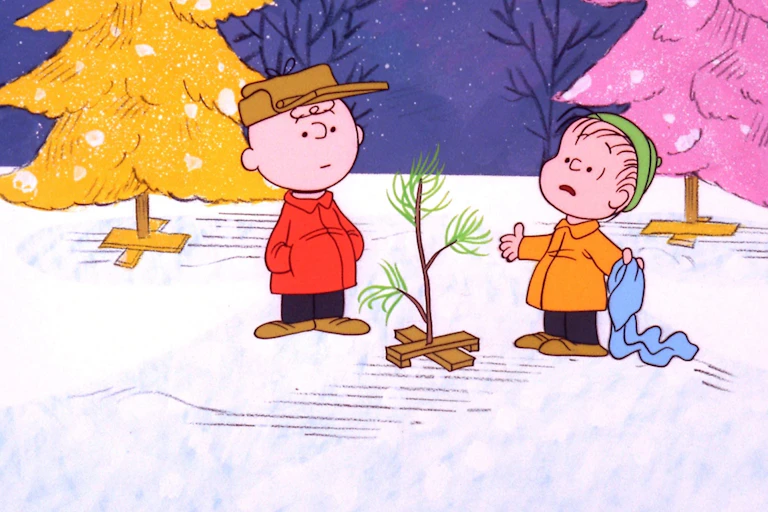 Cartoon of two boys next to a scrappy evergreen tree.