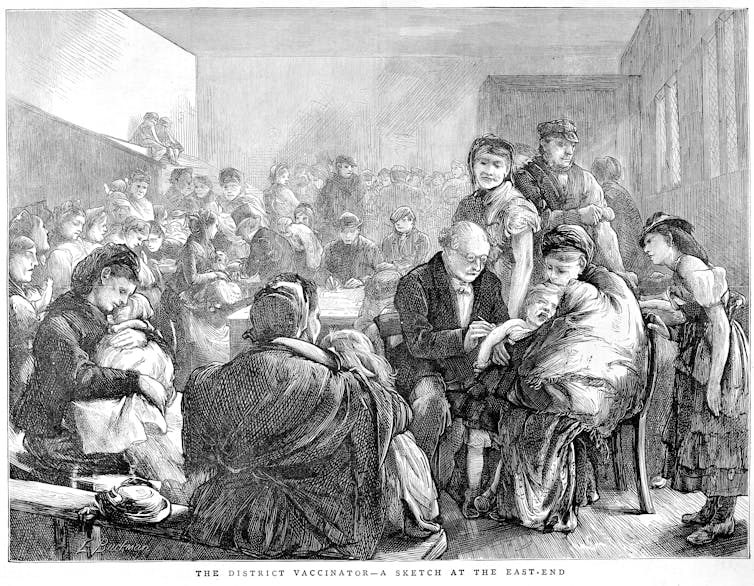 Etching of children being vaccinated in East London in a crowded, chaotic room.