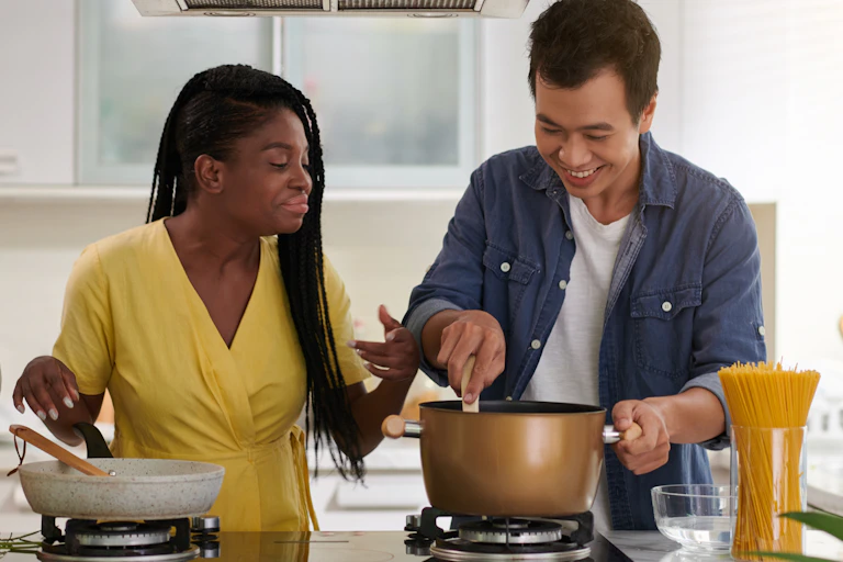Couple cooking together