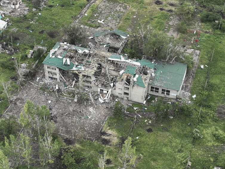 An aerial photo of a destroyed school building.