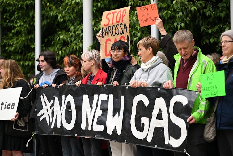 Protestors outside the Federal Court in Melbourne in 2022 seeking to stop a Santos offshore gas project in the Northern Territory.